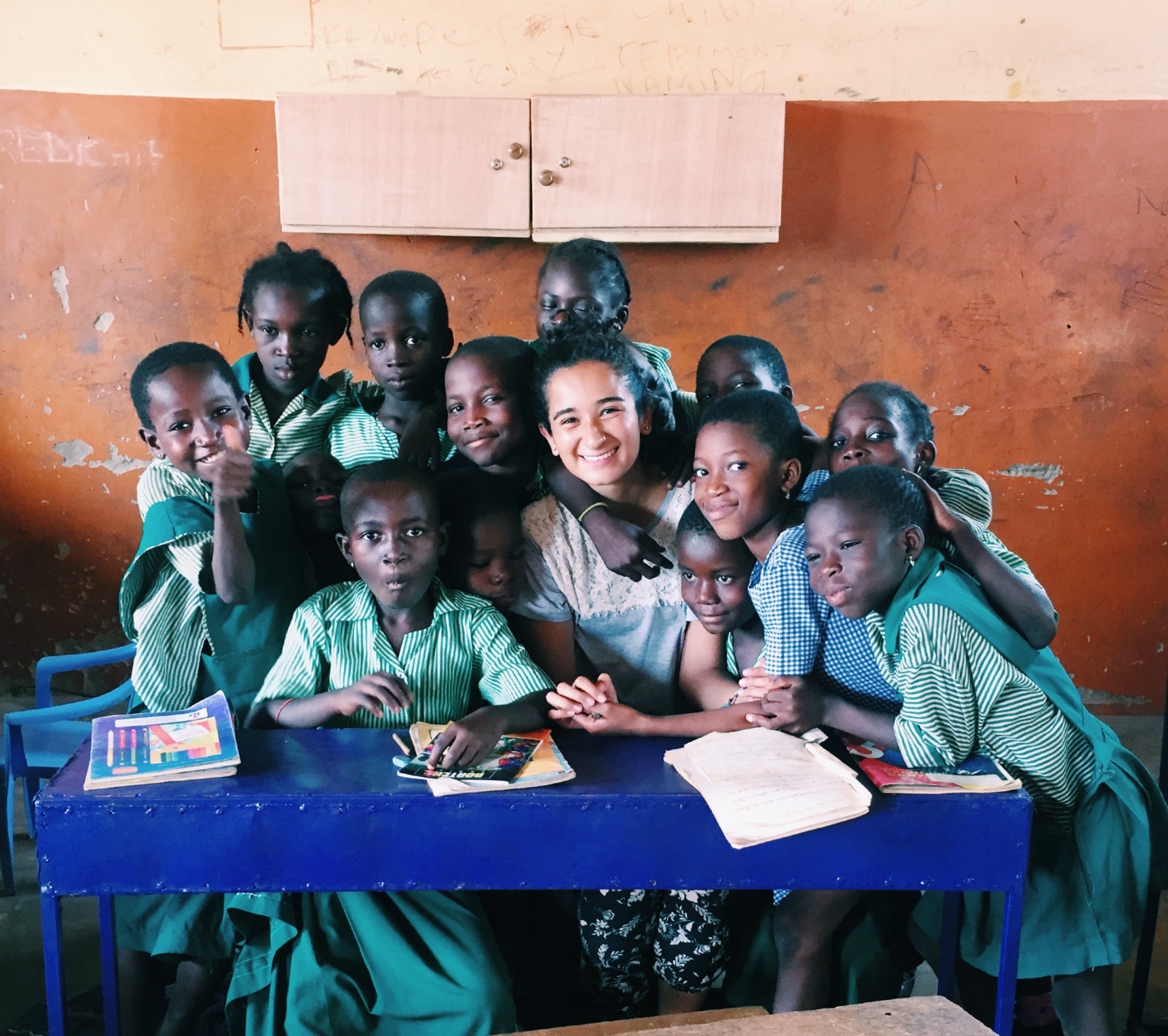 volunteer girl teaching in Ghana